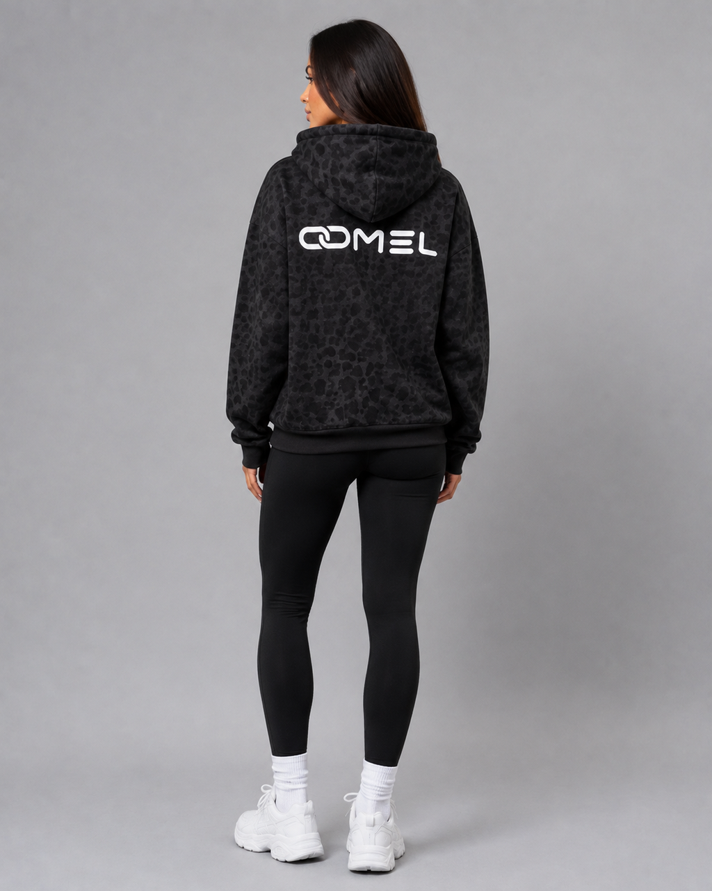 OOMEL rear view with large wordmark
